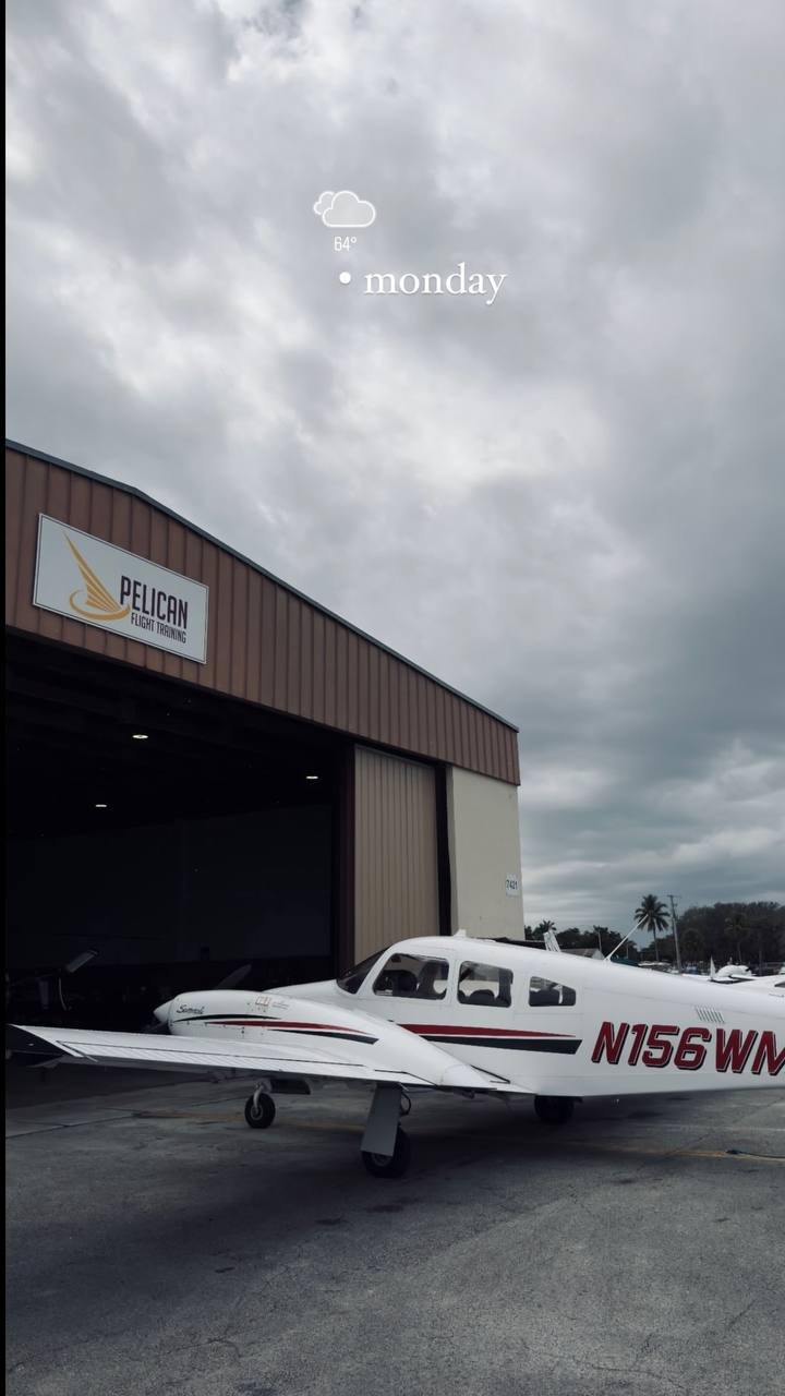 Pelican Flight Training Piper Seminole twin-engine trainer at the hangar