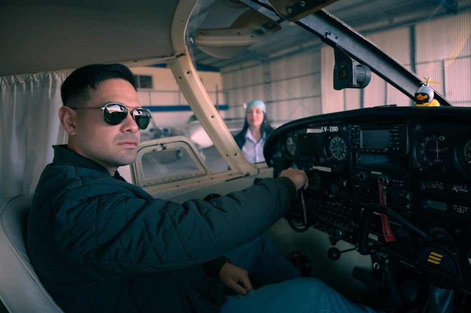 Flight instructor and student pilot in a Cessna cockpit during a Part 61 training lesson.