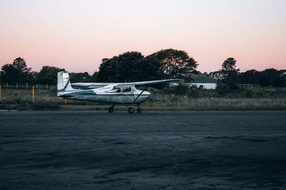 Single engine training airplane on the runway at a Part 61 flight school.