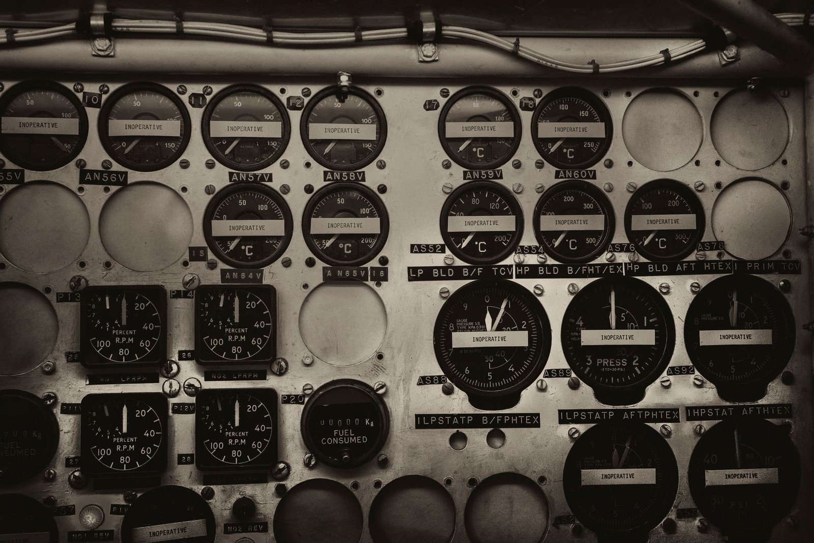 Closeup of an aircraft instrument panel with attitude indicator