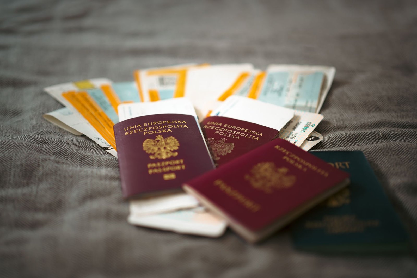 Passport and visa documents on a desk for a US student visa application
