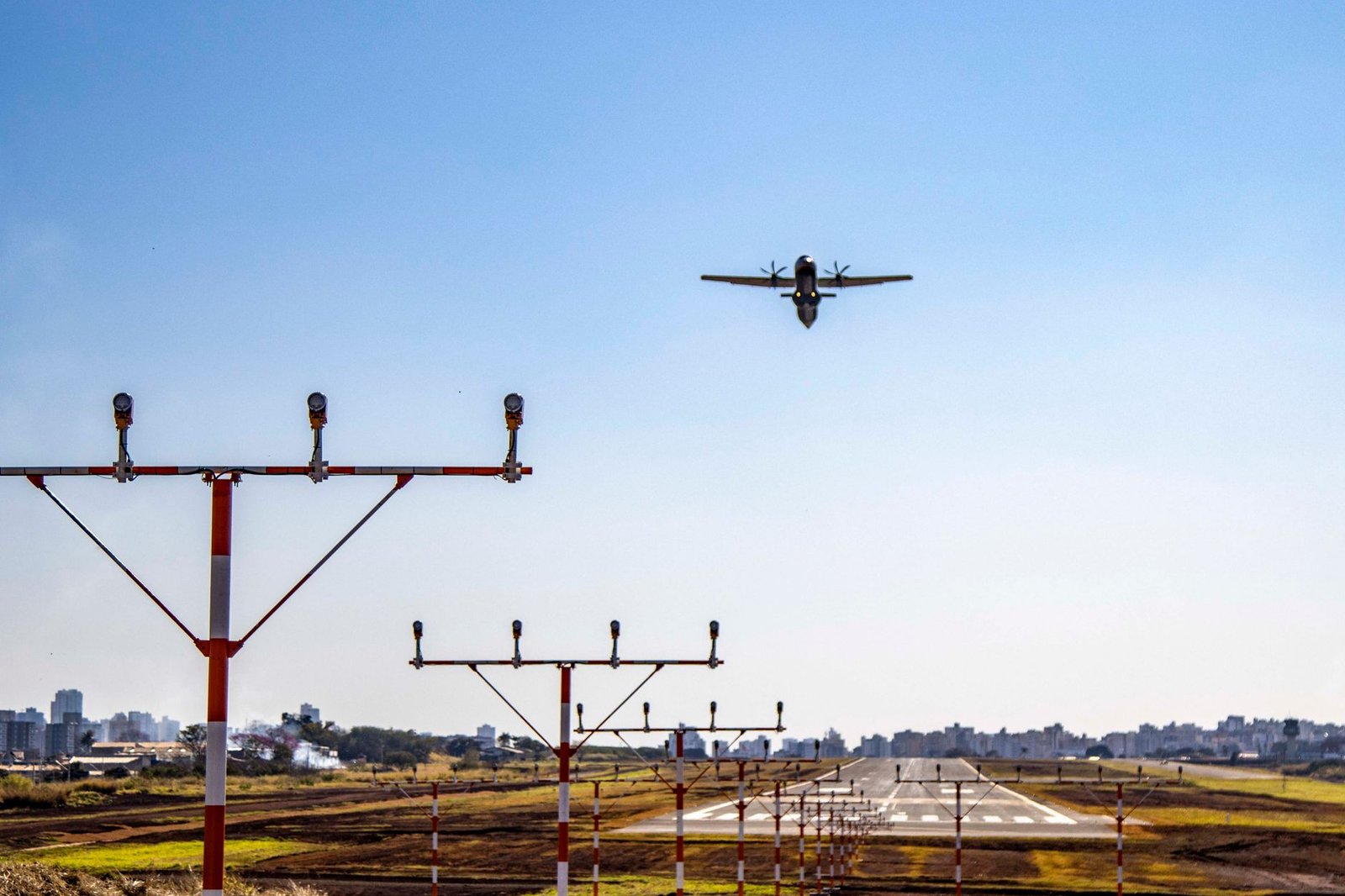 Light aircraft taking off from the airfield on a solo flight