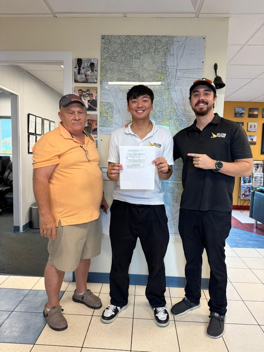 Pelican student Erich with his instructor and the examiner after passing his CFI checkride