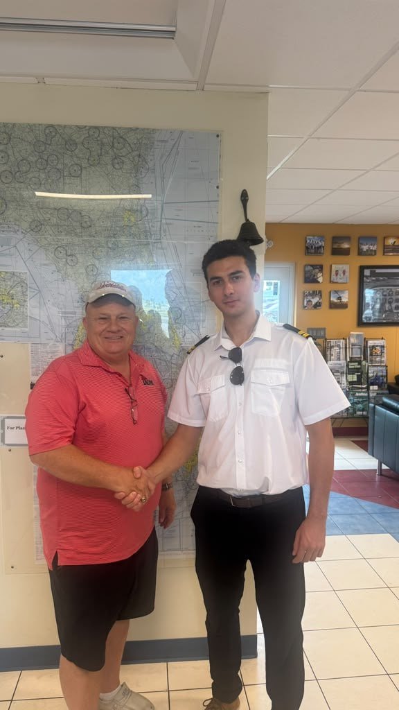 Moazzam and his training partner after passing their Instrument Rating checkride at Pelican Flight Training