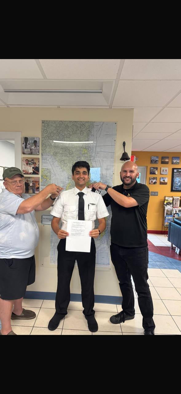 New Pelican pilot with instructors