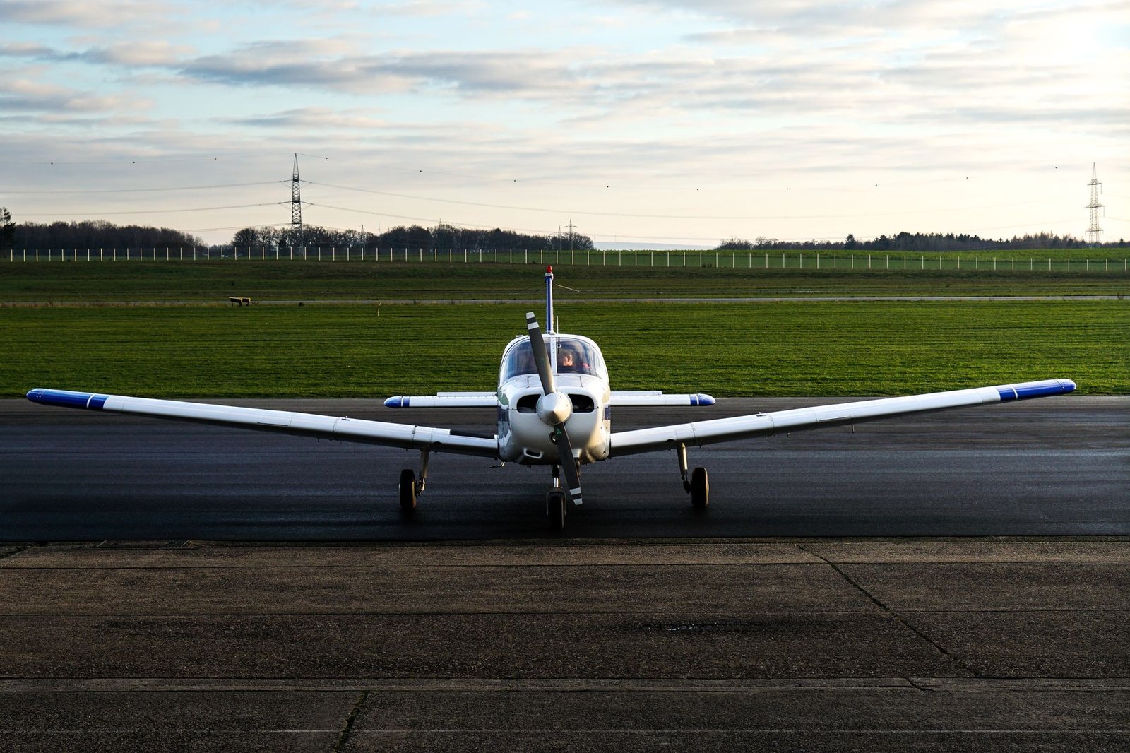 Single-engine training airplane parked on the ramp at a Florida flight school